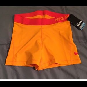 Orange Nike spandex